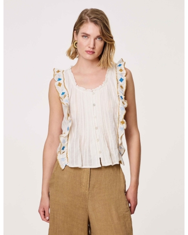 It 's an ethnic romantic blouse